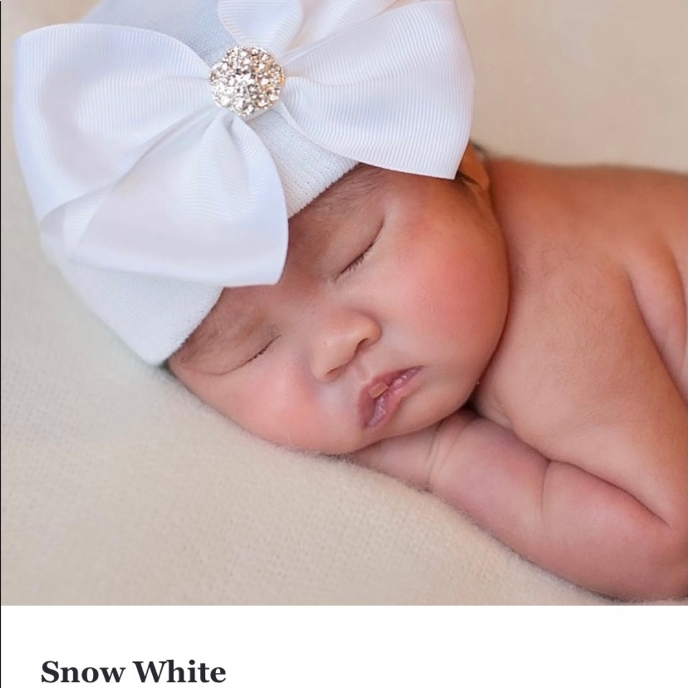 Make an offer!! 
Bundle - 14 Newborn baby girl beanies. Prices varies by…
